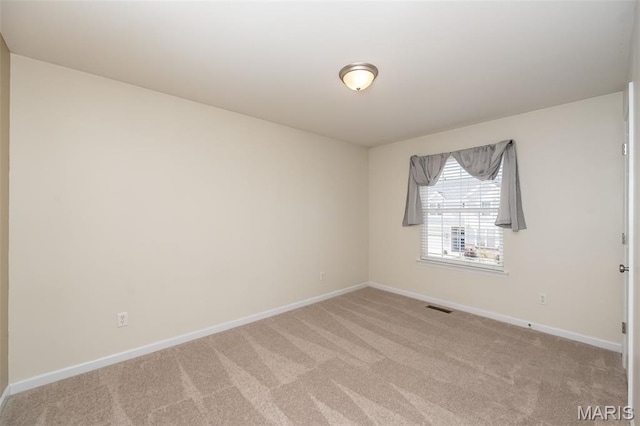 510 Newkirk Cir, Saint Charles, MO 63303 - spare room featuring light colored carpet and baseboards