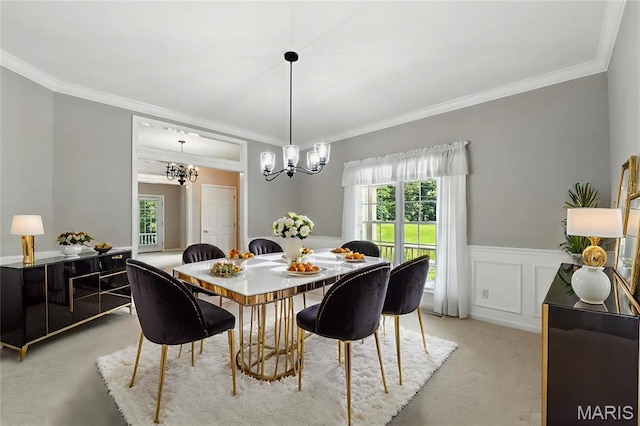 1605 High Sierra Dr, Foristell, MO 63348 - dining room with crown molding, light carpet, a chandelier, and a wainscoted wall