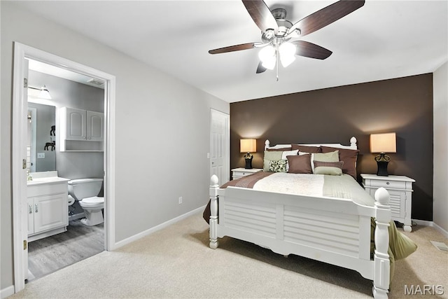 1605 High Sierra Dr, Foristell, MO 63348 - bedroom featuring light carpet, ensuite bath, and ceiling fan
