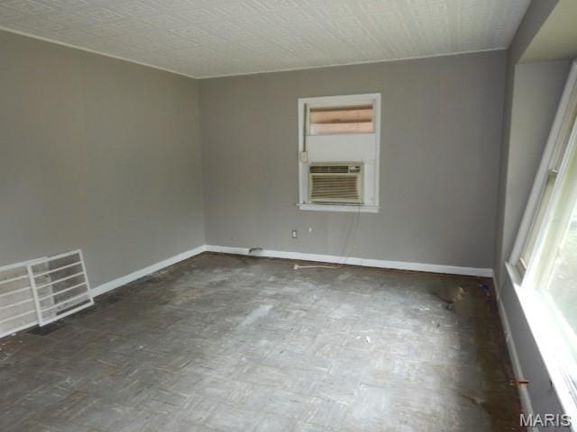11947 Bridgevale Ave, Saint Louis, MO 63138 - empty room featuring baseboards and cooling unit