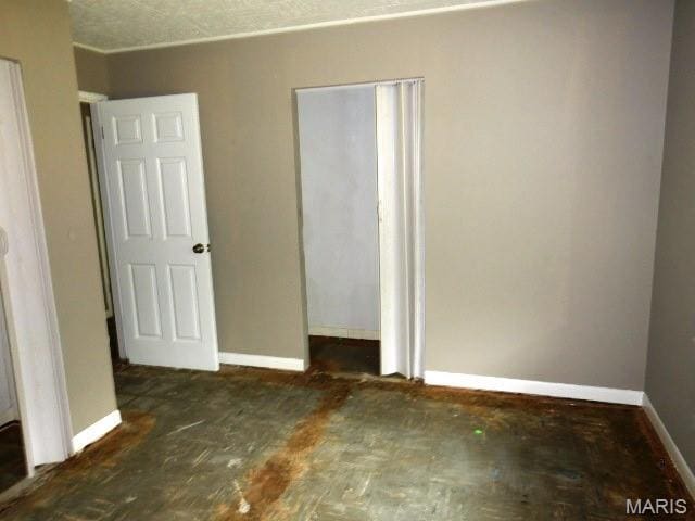 11947 Bridgevale Ave, Saint Louis, MO 63138 - unfurnished bedroom featuring baseboards