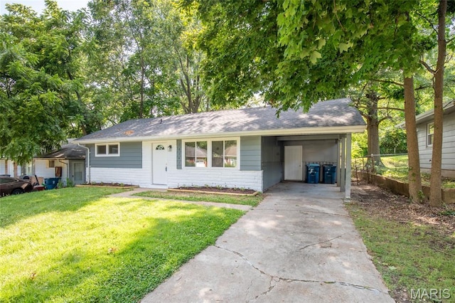 10141 Ventura Dr, Ferguson Township, MO 63136 - view of front of house with driveway and a carport