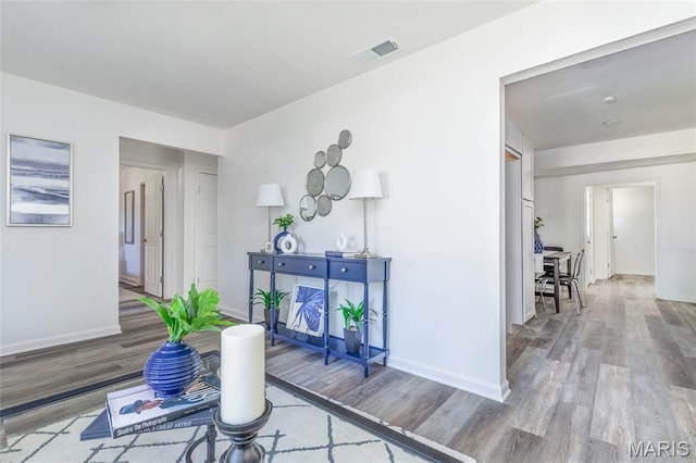 10141 Ventura Dr, Ferguson Township, MO 63136 - hallway featuring wood finished floors