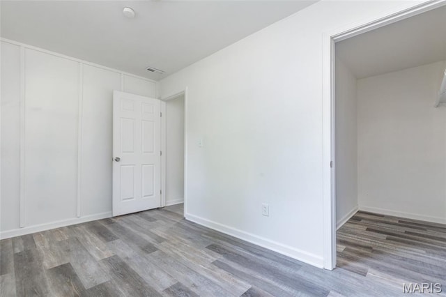 10141 Ventura Dr, Ferguson Township, MO 63136 - empty room featuring wood finished floors