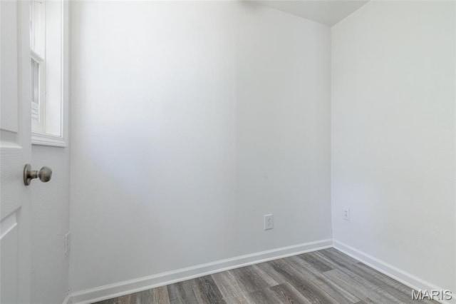 10141 Ventura Dr, Ferguson Township, MO 63136 - spare room with wood finished floors and baseboards