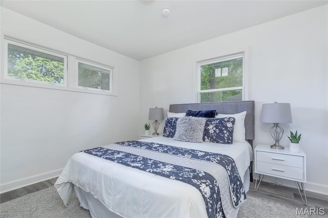 10141 Ventura Dr, Ferguson Township, MO 63136 - bedroom with wood finished floors and baseboards
