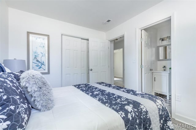10141 Ventura Dr, Ferguson Township, MO 63136 - bedroom with baseboards and a closet