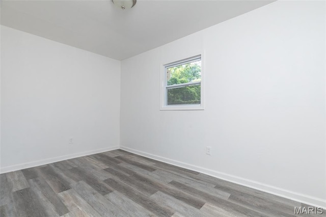 10141 Ventura Dr, Ferguson Township, MO 63136 - unfurnished room featuring wood finished floors
