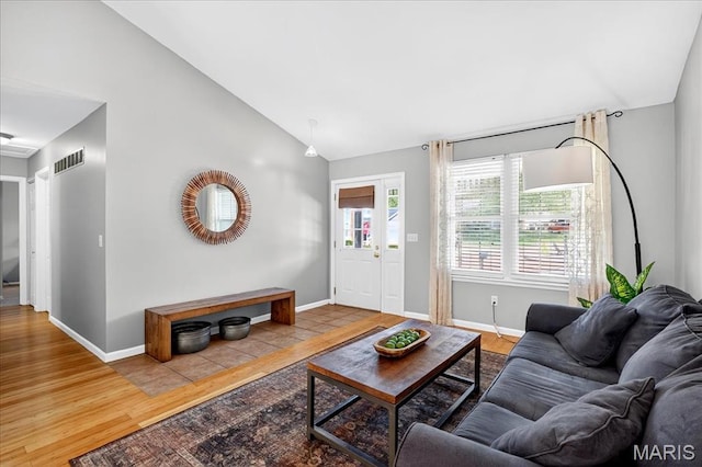 1826 Fairwood Forest Dr, Saint Peters, MO 63376 - living room with wood finished floors and high vaulted ceiling