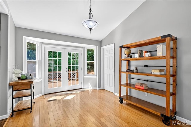 1826 Fairwood Forest Dr, Saint Peters, MO 63376 - entryway with french doors, light wood-style floors, and lofted ceiling