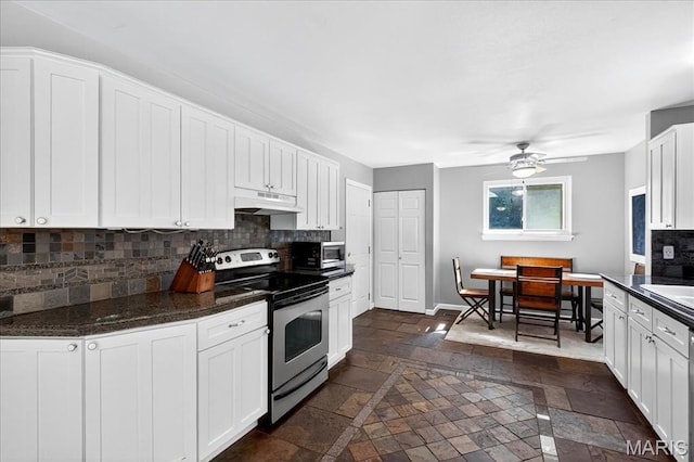 1826 Fairwood Forest Dr, Saint Peters, MO 63376 - kitchen with appliances with stainless steel finishes, under cabinet range hood, stone tile floors, decorative backsplash, and white cabinets
