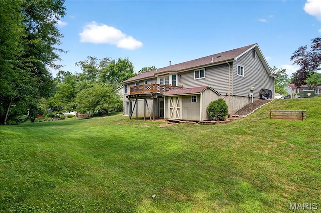 1826 Fairwood Forest Dr, Saint Peters, MO 63376 - rear view of property featuring a storage unit, a deck, and a yard