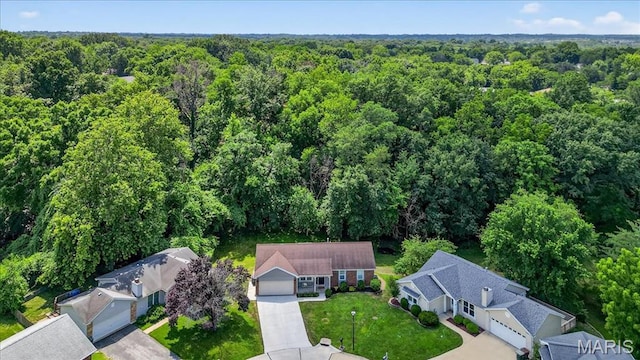 1826 Fairwood Forest Dr, Saint Peters, MO 63376 - drone / aerial view of a heavily wooded area