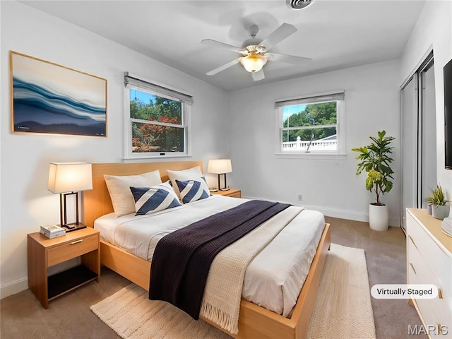 248 Ramsey Ln, Ballwin, MO 63021 - bedroom featuring carpet floors, a closet, and ceiling fan