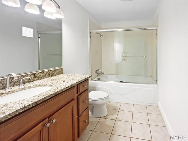248 Ramsey Ln, Ballwin, MO 63021 - full bath with vanity, tile patterned floors, and shower / bath combination with glass door