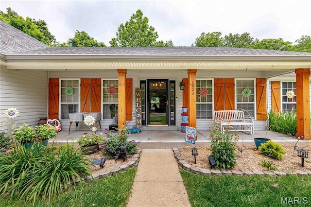 1923 Smizer Mill Rd, Fenton, MO 63026 - doorway to property with a porch and a shingled roof