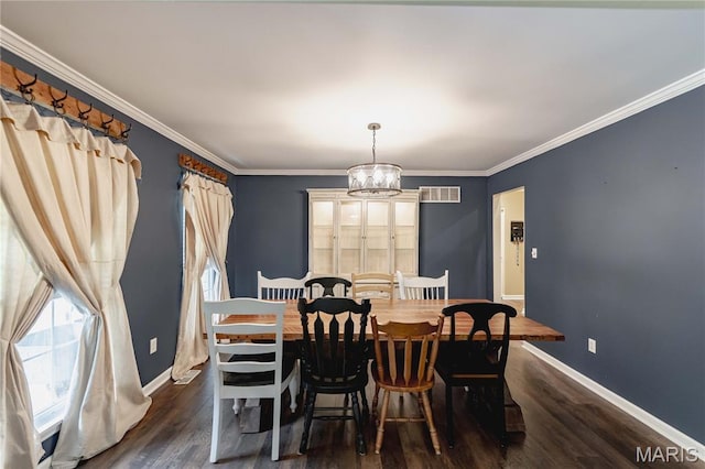 1923 Smizer Mill Rd, Fenton, MO 63026 - dining space with a chandelier, dark wood-style floors, and ornamental molding