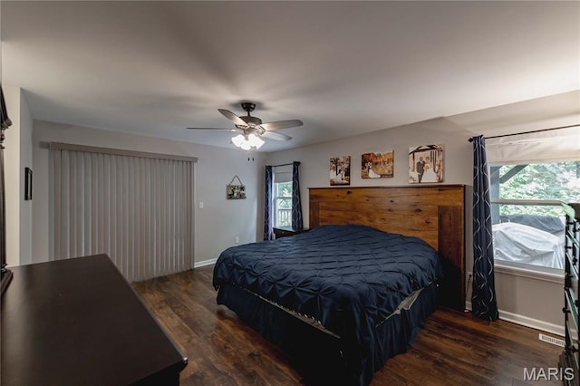 1923 Smizer Mill Rd, Fenton, MO 63026 - bedroom featuring multiple windows, wood finished floors, and ceiling fan