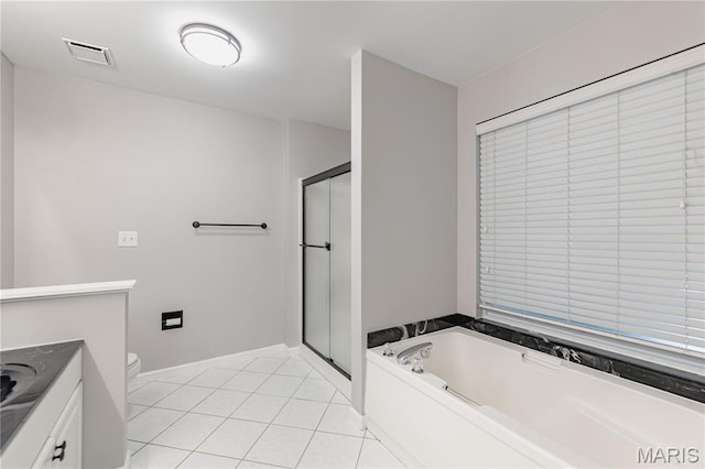 1923 Smizer Mill Rd, Fenton, MO 63026 - bathroom featuring a shower stall, a bath, vanity, and tile patterned flooring