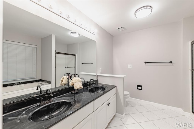1923 Smizer Mill Rd, Fenton, MO 63026 - bathroom with double vanity, a shower stall, tile patterned floors, and a tub