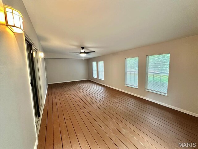 1923 Smizer Mill Rd, Fenton, MO 63026 - unfurnished room with dark wood-style flooring and ceiling fan