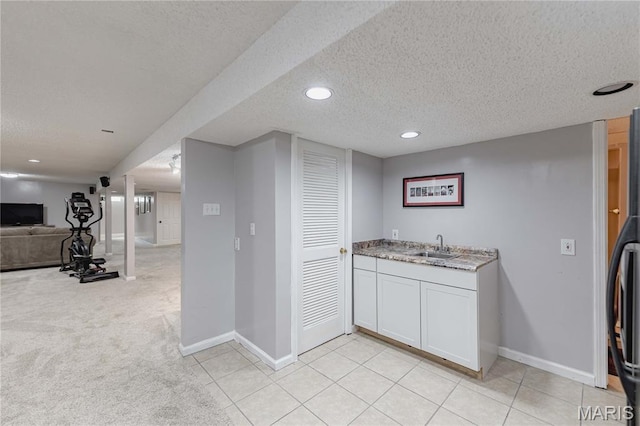1923 Smizer Mill Rd, Fenton, MO 63026 - indoor wet bar with a textured ceiling, recessed lighting, and light tile patterned floors
