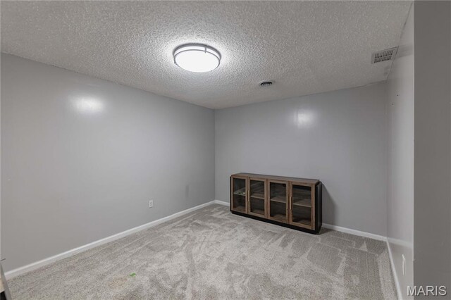 1923 Smizer Mill Rd, Fenton, MO 63026 - carpeted empty room with a textured ceiling and baseboards