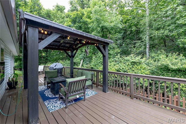 1923 Smizer Mill Rd, Fenton, MO 63026 - wooden deck featuring a gazebo, an outdoor hangout area, area for grilling, and a wooded view