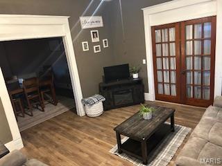 200 N Madison St, Kinmundy, IL 62854 - living room with french doors and wood finished floors