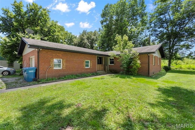 17999 State Highway 177, Jackson, MO 63755 - view of front of home with brick siding and a front yard