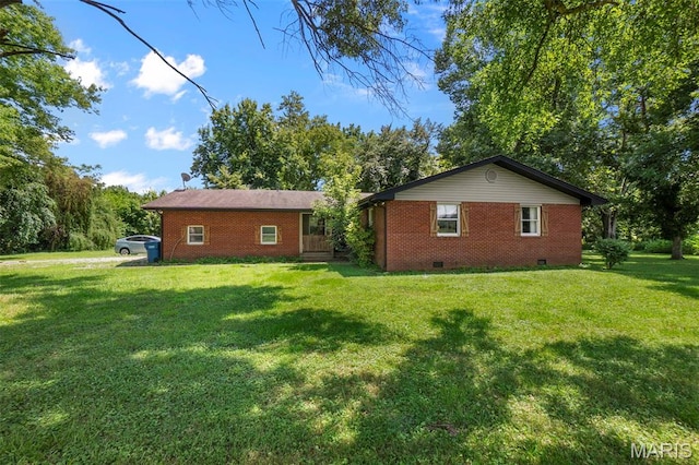17999 State Highway 177, Jackson, MO 63755 - view of property exterior with crawl space, brick siding, and a yard