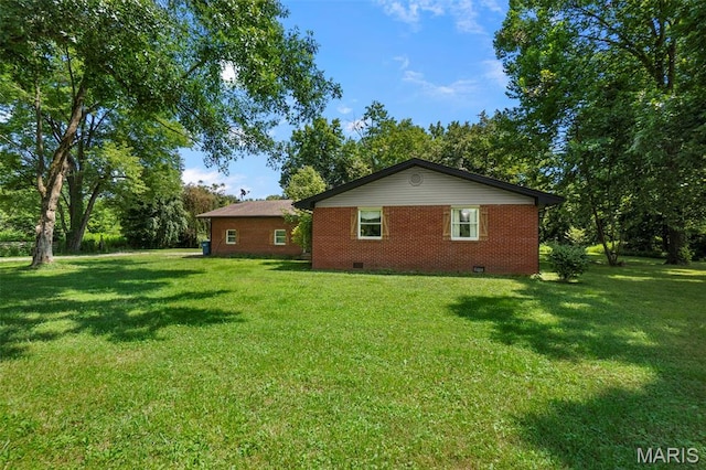 17999 State Highway 177, Jackson, MO 63755 - view of property exterior with crawl space, a yard, and brick siding