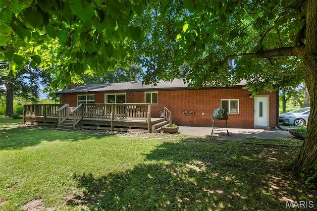 17999 State Highway 177, Jackson, MO 63755 - rear view of property with brick siding, a lawn, and a wooden deck