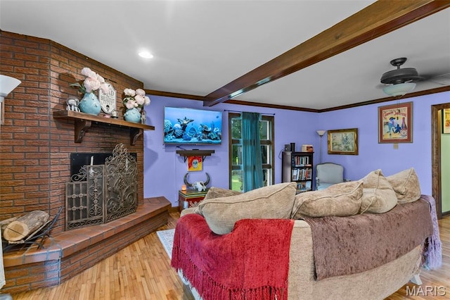 17999 State Highway 177, Jackson, MO 63755 - living room with wood finished floors, ornamental molding, beam ceiling, a brick fireplace, and recessed lighting