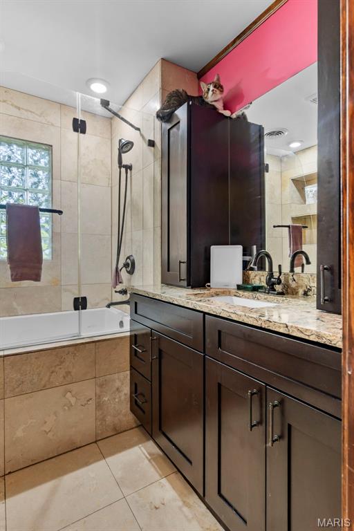 17999 State Highway 177, Jackson, MO 63755 - full bath featuring tiled shower / bath, tile patterned flooring, and vanity