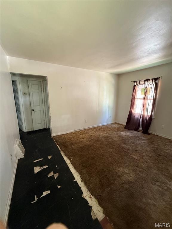 8030 Aline Ave, Berkeley, MO 63134 - carpeted empty room with baseboards