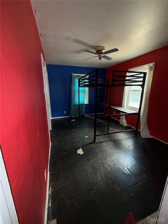 8030 Aline Ave, Berkeley, MO 63134 - unfurnished bedroom featuring ceiling fan and baseboards