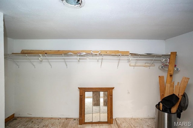 200 S Frisco, Crocker, MO 65452 - spacious closet with wood finished floors