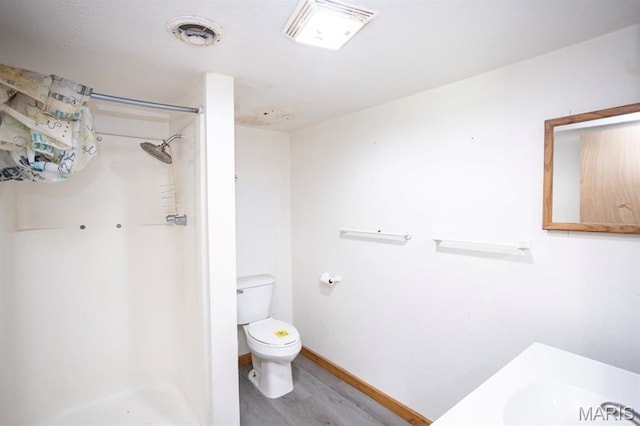 200 S Frisco, Crocker, MO 65452 - bathroom with wood finished floors and a shower