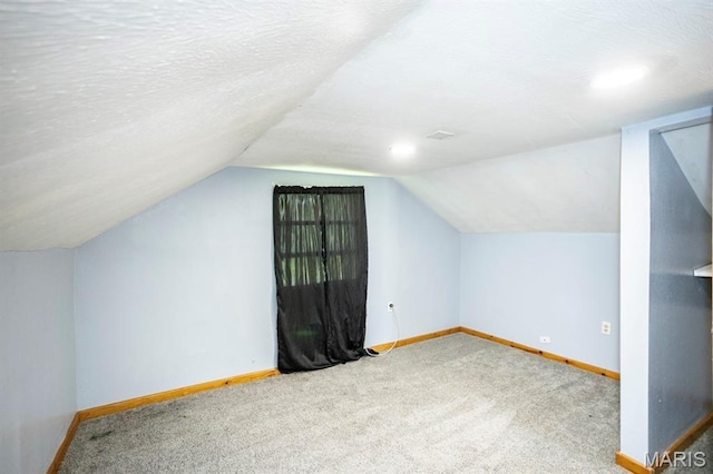 200 S Frisco, Crocker, MO 65452 - additional living space featuring vaulted ceiling and carpet flooring