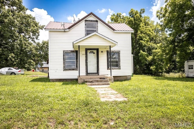 200 S Frisco, Crocker, MO 65452 - view of front facade with a front yard and a metal roof