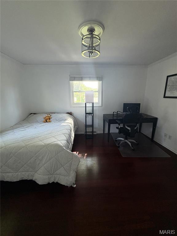 2941 Elmcrest Dr, Saint Charles, MO 63301 - bedroom with dark wood-style floors, a chandelier, and crown molding