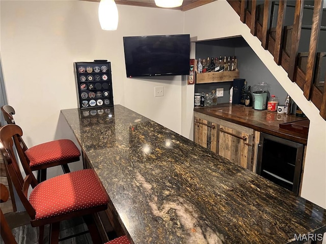 2941 Elmcrest Dr, Saint Charles, MO 63301 - indoor dry bar with wine cooler and stairs