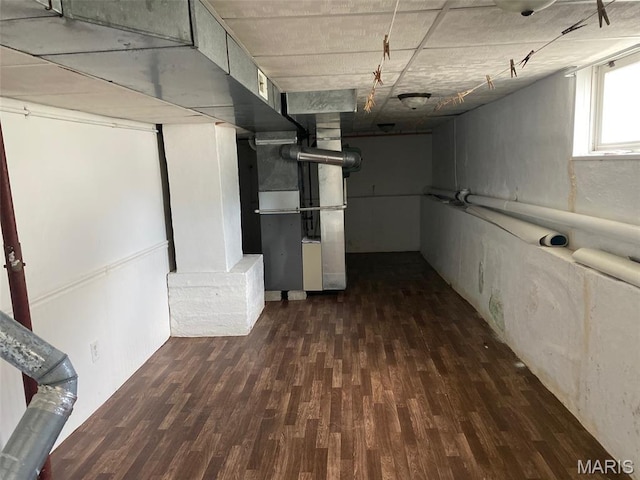 464 S Mill St, Nashville, IL 62263 - below grade area with wood finished floors and heating unit