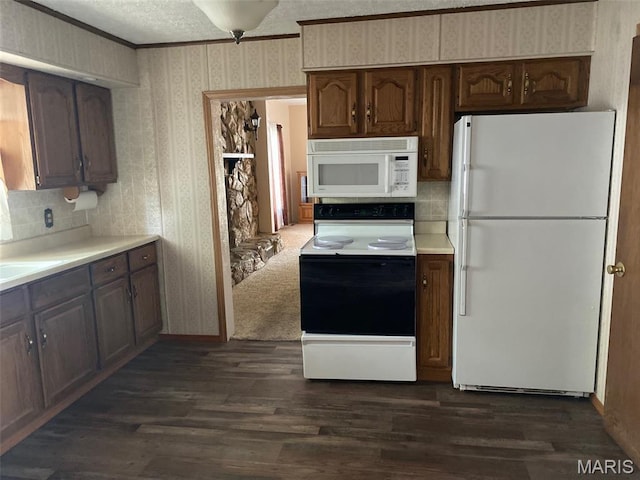 464 S Mill St, Nashville, IL 62263 - kitchen with white appliances, wallpapered walls, dark wood finished floors, ornamental molding, and light countertops