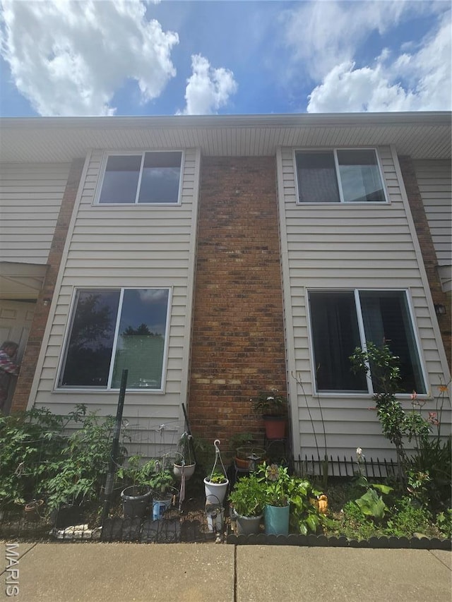 1331 Dartmouth Ct, Saint Charles, MO 63303 - view of side of home with brick siding