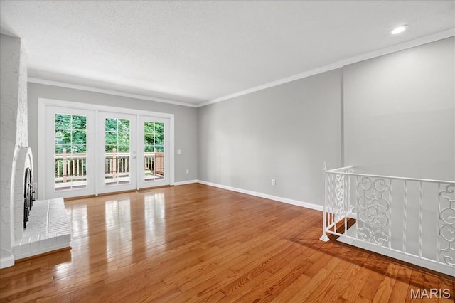 775 Knickerbacker Dr, Manchester, MO 63021 - unfurnished living room featuring crown molding, light wood finished floors, and recessed lighting
