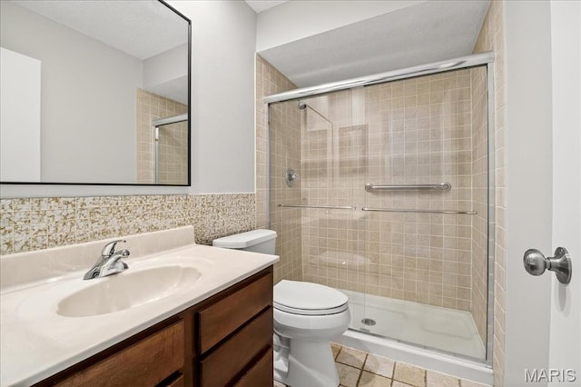 775 Knickerbacker Dr, Manchester, MO 63021 - full bathroom featuring vanity, a stall shower, tile walls, and wainscoting