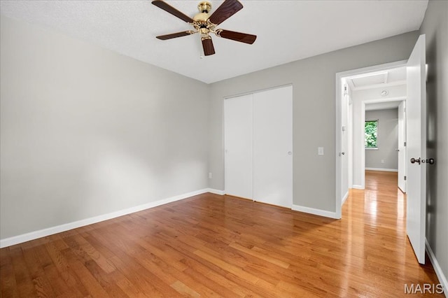 775 Knickerbacker Dr, Manchester, MO 63021 - unfurnished bedroom featuring light wood finished floors, a closet, and ceiling fan