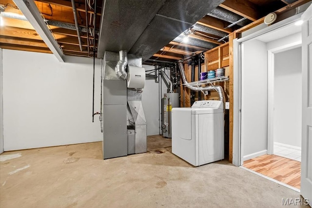 775 Knickerbacker Dr, Manchester, MO 63021 - unfinished basement with washer / clothes dryer, gas water heater, and heating unit